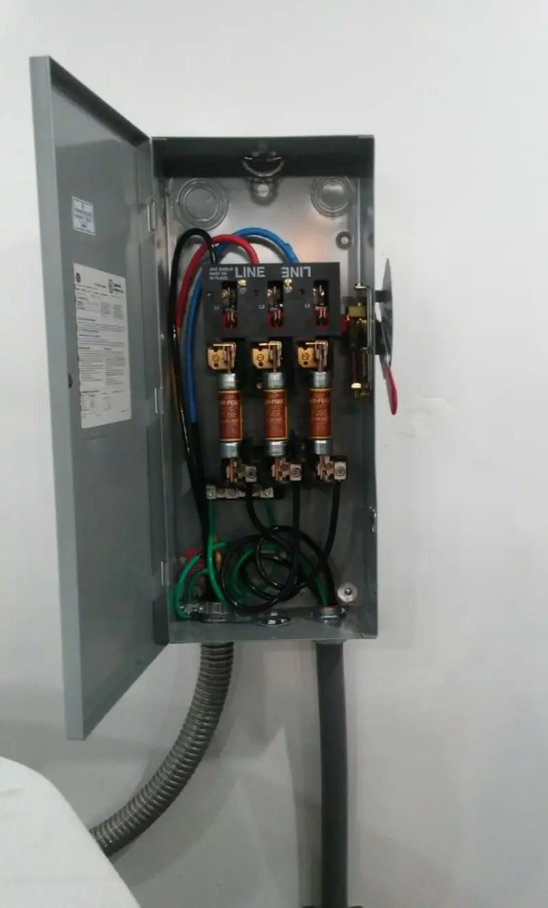Three-phase disconnect switch installed for Smoke Detector Installation in Seward