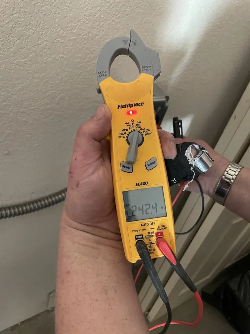 Voltage testing with clamp meter during Generator Installation in Seward